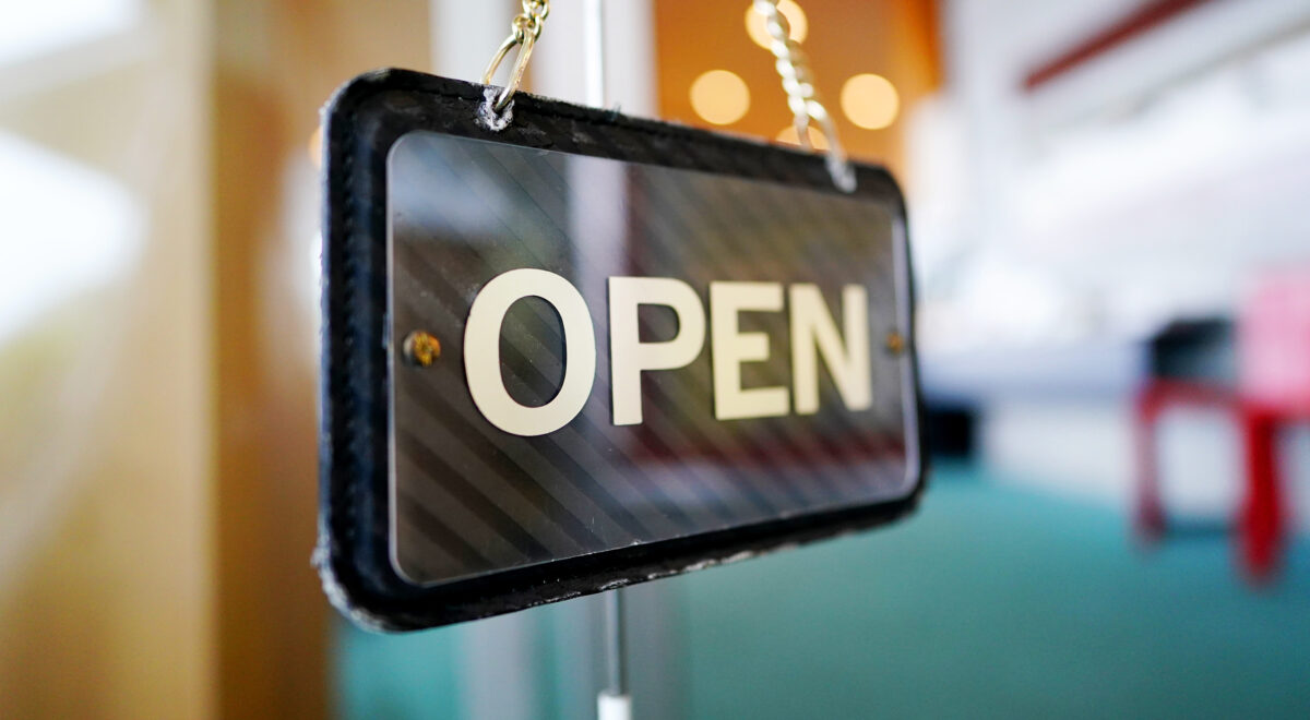 Open sign on cafe hang on door 4